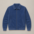 Haze Blue men's corduroy jacket displayed straight on against a plain studio background.