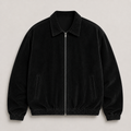 Black men's corduroy jacket displayed straight on against a plain studio background.