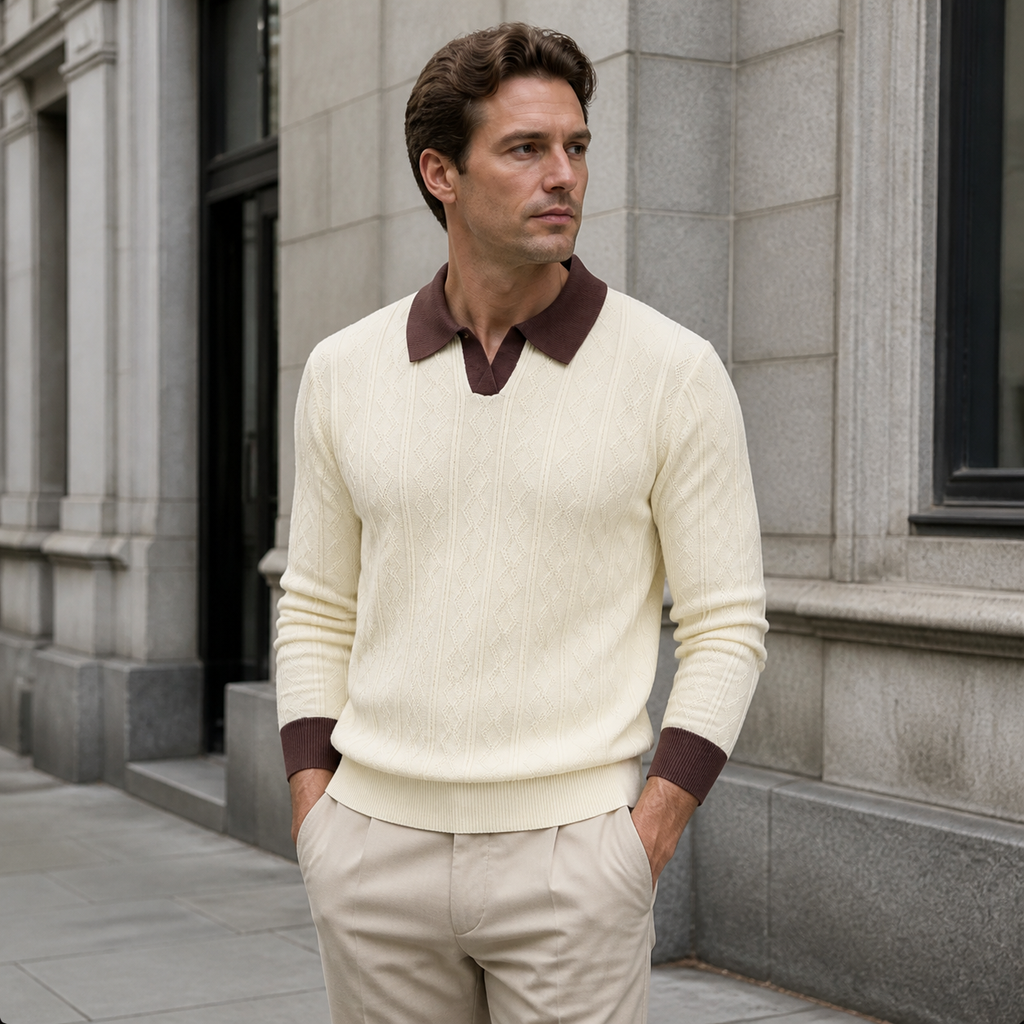 Man styling the apricot men's polo sweater on a quiet US city street.