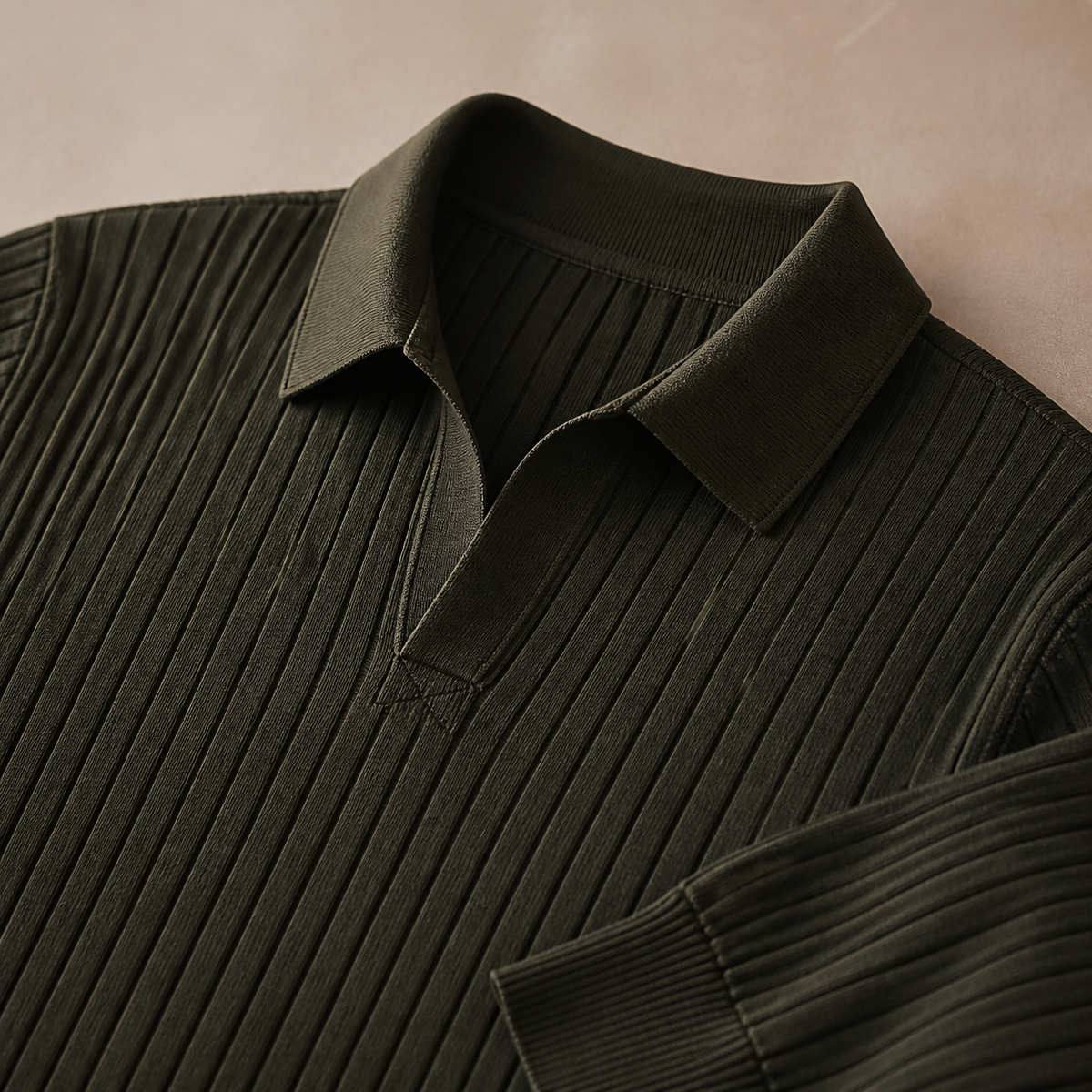 Close view of the olive men's polo sweater showing its neckline and distinctive surface texture.